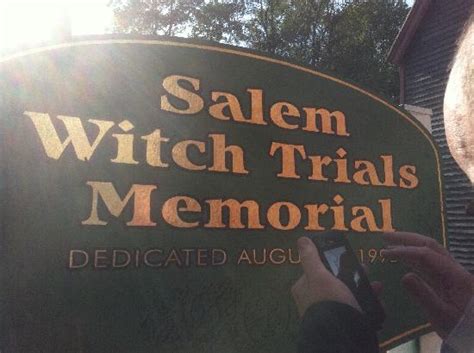 The narrative of the Salem witch trials memorial plaque: Honoring victims and acknowledging past injustices.